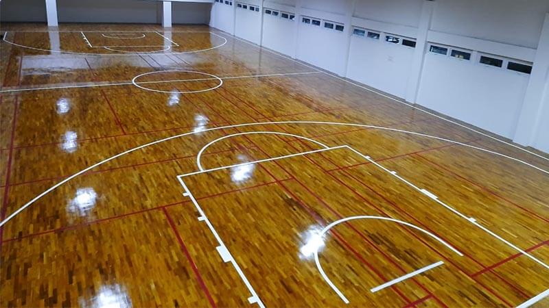 Project lantai kayu Asia di Makassar International School